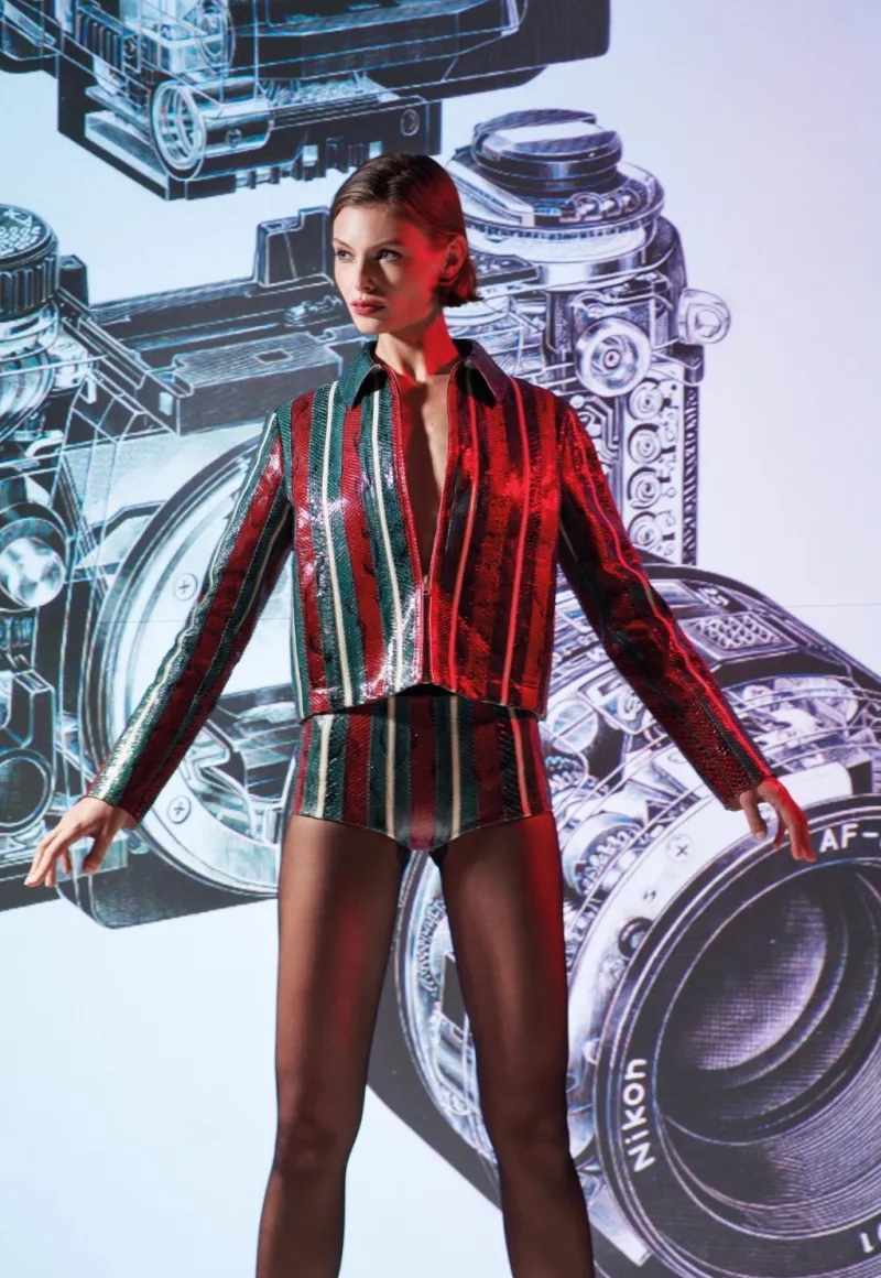 Bibi Breslin in red striped sequined outfit